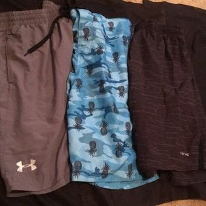 3pairs of swim trunks. Underarmour